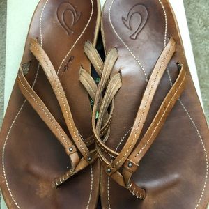 Olukai brown leather flip flops